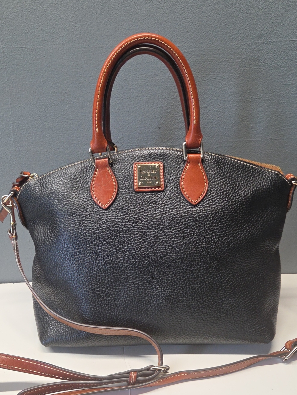 Dooney & Bourke Black Pebble Leather Satchel with Brown Trim